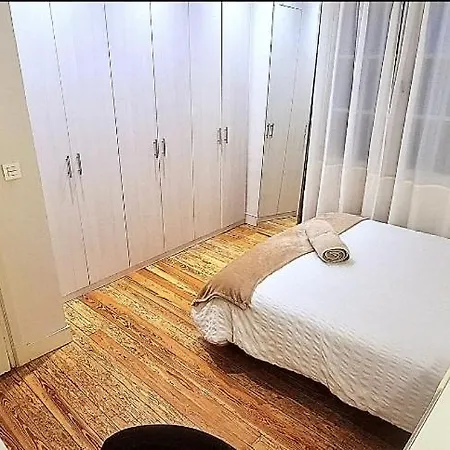 Quarto em Acomodações Particulares Privadas En Piso Frente A Playa Ondarreta, Bano Compartido